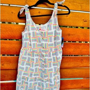 Cute summer dress with rainbow colors. Small but runs on the larger size.